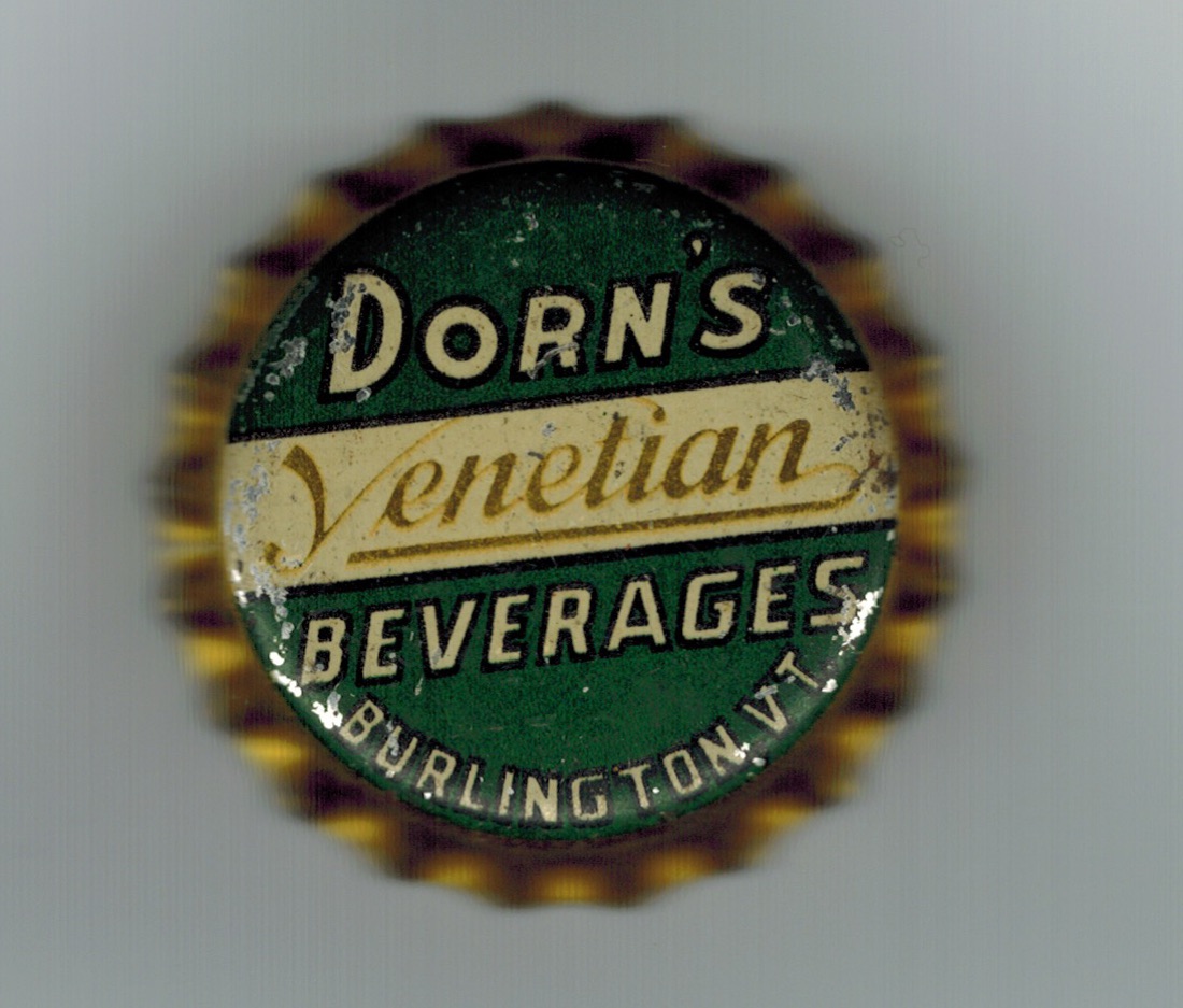 Green and cream bottle cap reading Dorn's Venetian Beverages, Burlington VT